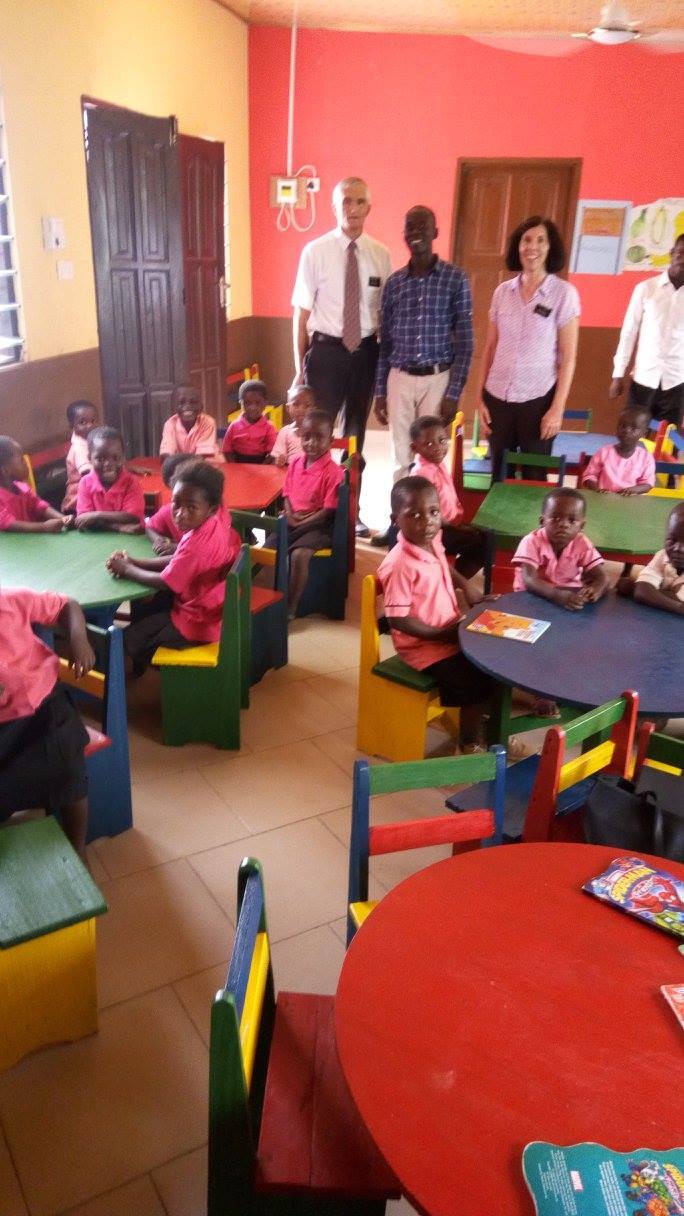 PROaid Africa staff with school children