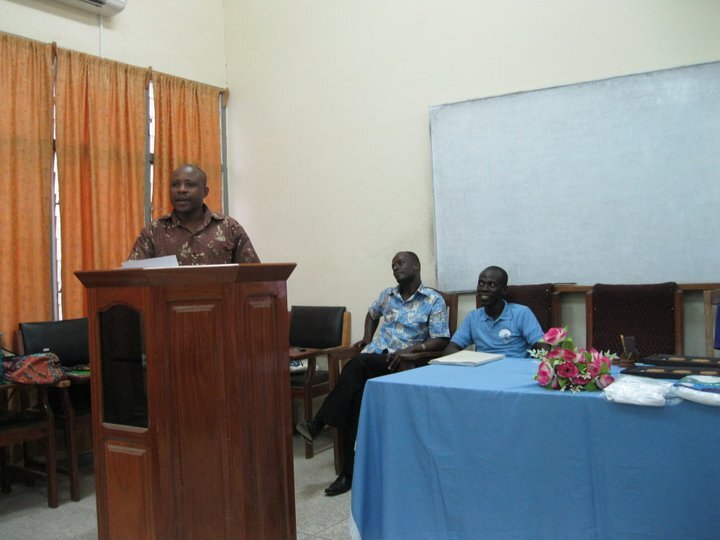 A keynote speaker addressing guests at a PROaid Africa fundraiser event