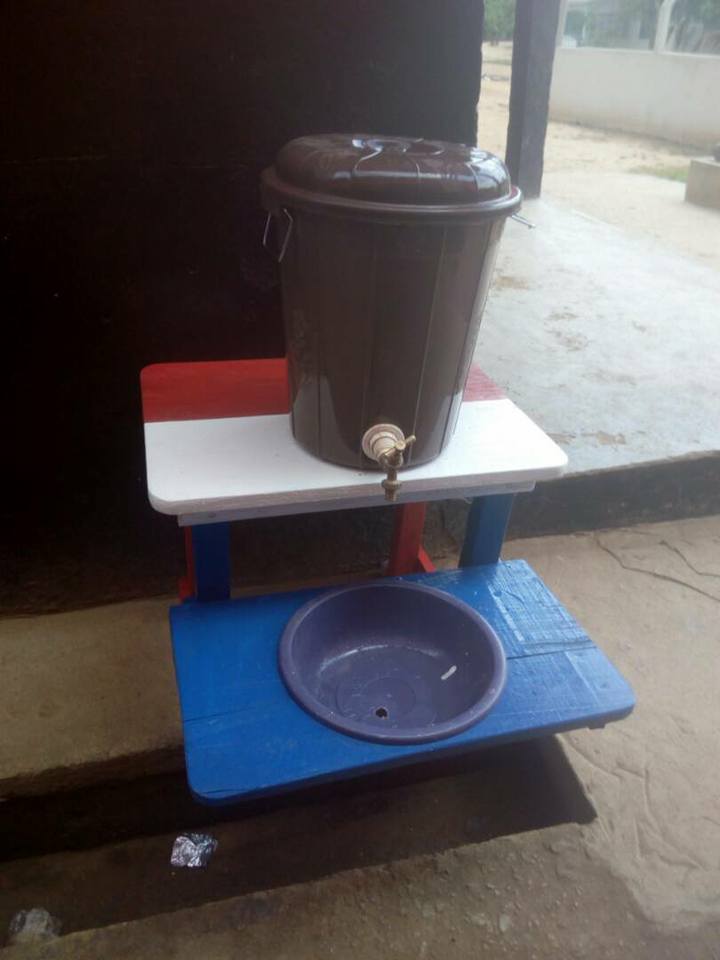 Community members learning handwashing